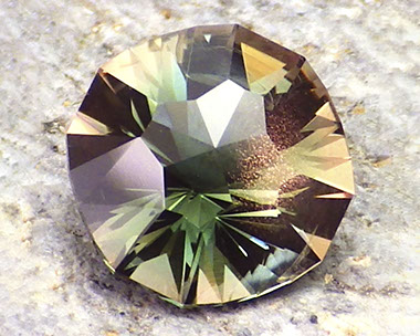 2.48 ct Peacock Green Schiller Oregon Sunstone in Arya Akhavan PANA MINE-SPARKLING WELL design, rough from PANA Mine, 2018