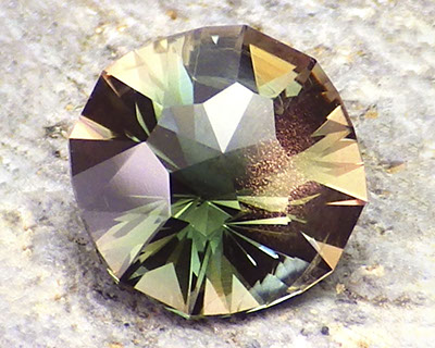 2.48 ct Peacock Green Schiller Oregon Sunstone in Arya Akhavan PANA MINE-SPARKLING WELL design, rough from PANA Mine, 2018