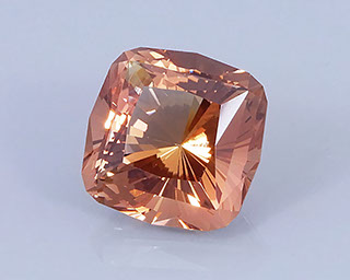 9.69 ct Peach-Copper Oregon Sunstone in Fancy Cushion with 32 Pavilion Main Facets, Rough from Sunstone Butte Mine