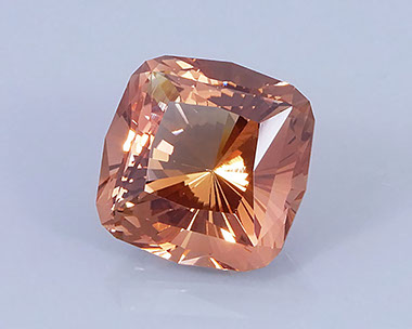 9.69 ct Peach-Copper Oregon Sunstone in Fancy Cushion with 32 Pavilion Main Facets, Rough from Sunstone Butte Mine