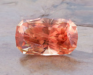 7.86 ct Peach Schiller Oregon Sunstone in Barion Antique Cushion, Rough from PANA Mine